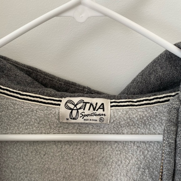 Long fit TNA Active Zip Up - Picture 2 of 2